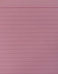A close up of the light pink tinted inner page that are 6mm dark pink lined.